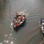 family and friends enjoy their foldable boat
